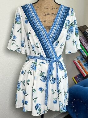 White Floral Wrap Romper with Blue Trim
